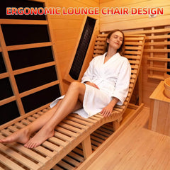 Rövia Oasis 3-person indoor hybrid sauna room by SAKSBY WHOLESALE with built-in lounge chair, woman relaxing inside the sauna.