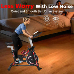 Rovix indoor exercise spin bike with cushioned seat, black frame, adjustable handlebars, and digital display for home workout.