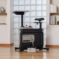 WalkingPad foldable exercise bike near window, compact under-desk fitness equipment for low-impact workouts at home or office.