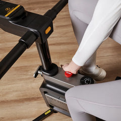 Close-up of WalkingPad foldable exercise bike pedal in action, showcasing compact design for under desk fitness workouts.
