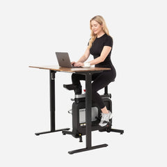 WalkingPad foldable exercise bike used as under-desk bike in a home office setting for convenient fitness and activity.
