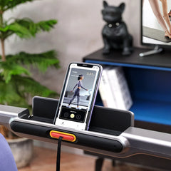 WalkingPad R2 foldable treadmill with adjustable handrails, suitable for walking and running exercises at home or gym.