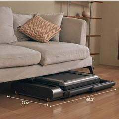 WalkingPad R3 Hybrid+ foldable walking treadmill stored under sofa, compact design ideal for home exercise spaces.