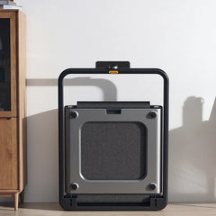WalkingPad X21 double-fold treadmill for exercise and fitness, shown with upright storage in a home gym setting.