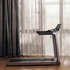 WalkingPad X218 foldable treadmill with wide deck and digital display, suitable for home exercise and fitness routines.