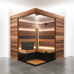 Indoor Thermasol Astra 4-Person Semi-Panoramic Glass Sauna Cabin by SAKSBY WHOLESALE, featuring clear glass walls and a spacious interior.